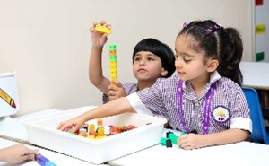 Young students with counting blocks