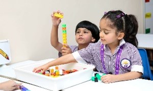 Young students with counting blocks
